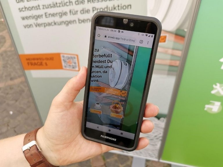 Bonn geht den Mehrweg: Mehrweg digital mit dem Smartphone erleben Bonn geht den Mehrweg: Smartphonedisplay mit AR-Anwendung